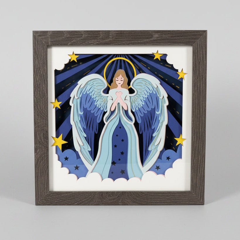 Framed artwork of an angel with a starry background